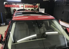 Оклейка крыши Range Rover Evogue черной глянцевой пленкой